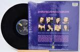 Vinyl record with a blue cover featuring album artwork and text.