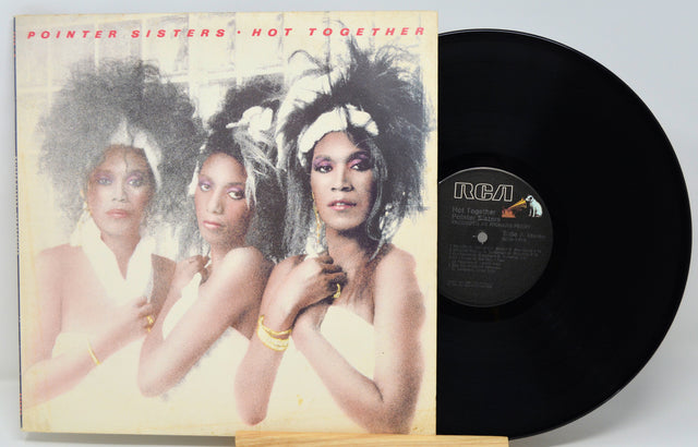 Vinyl record with cover featuring three women and 'Pointer Sisters Hot Together' text.