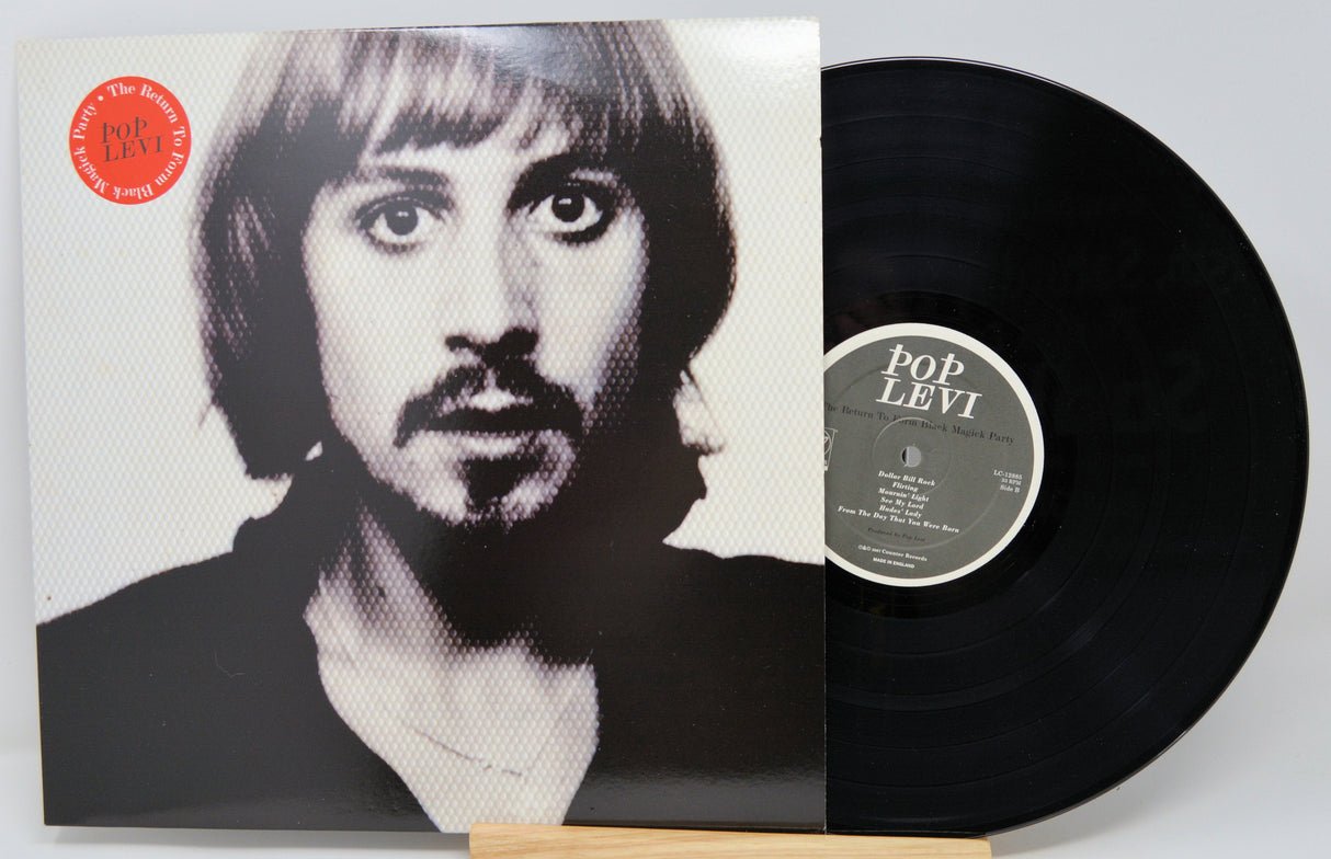 Front cover and vinyl of Pop Levi's The Return To Form Black Magick Party LP featuring Pop Levi's portrait