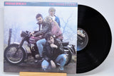 'Prefab Sprout Two Wheels Good' Vinyl record with a cover featuring three people on a motorcycle