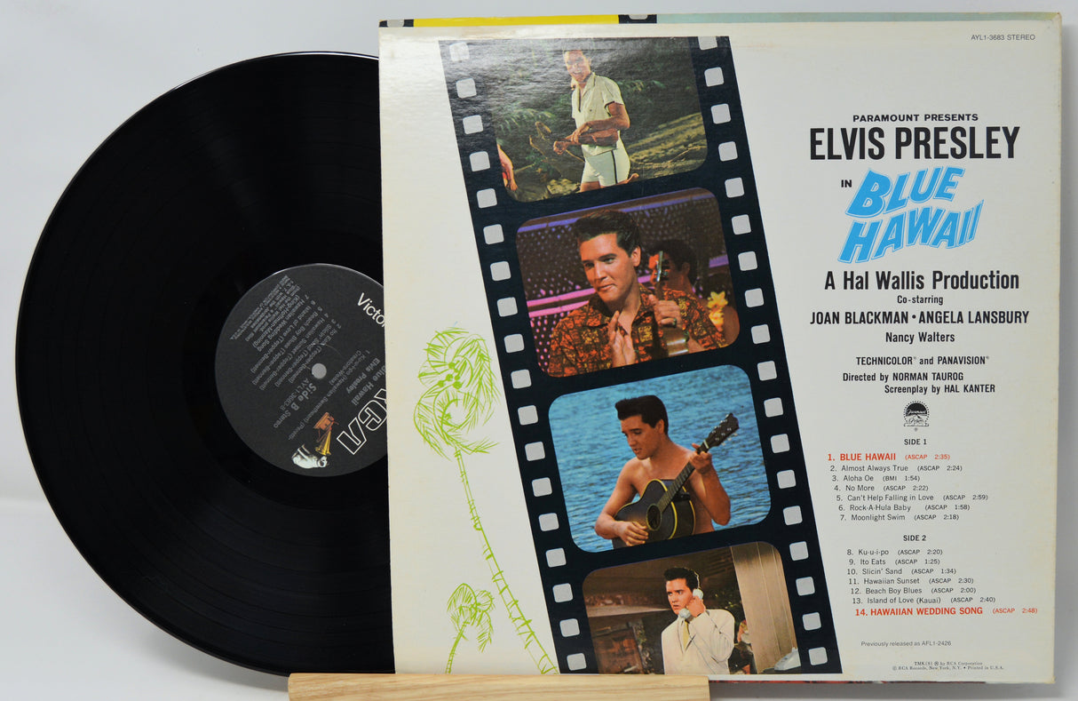 Vinyl record with a 'Blue Hawaii' movie poster design on the cover