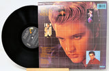 Vinyl record with cover featuring a grid pattern and images of a person, on a white background.