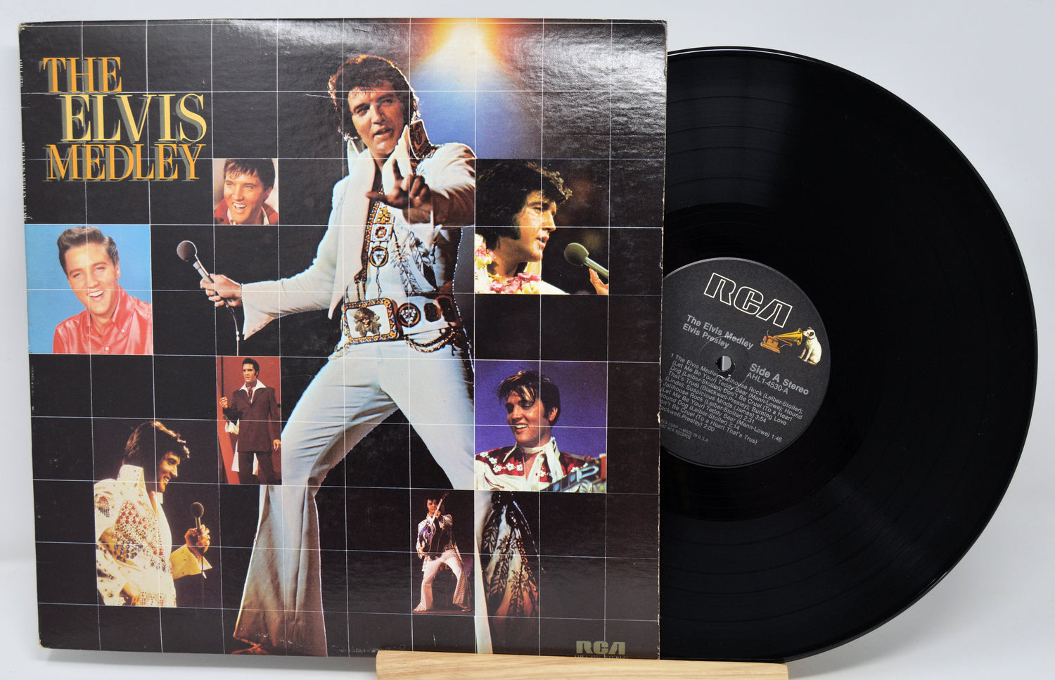 Vinyl record with cover featuring images of Elvis Presley and 'The Elvis Medley' text.