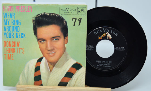 Elvis Presley record with cover featuring a portrait and album title.