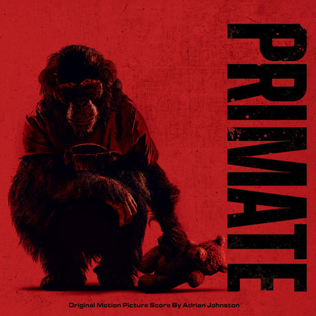 Silhouette of a chimpanzee holding a teddy bear on a red background with 'PRIMATE' text.
