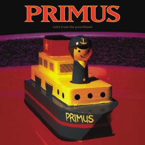A vinyl record album cover featuring a cartoon illustration of a boat with a character wearing a captain's hat, and the band name 'Primus' written across the boat.