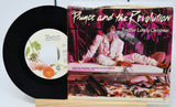 Vinyl record and cover of 'Another Lonely Christmas' by Prince and the Revolution.