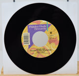 Vinyl record with Paisley Park Records label on a white background