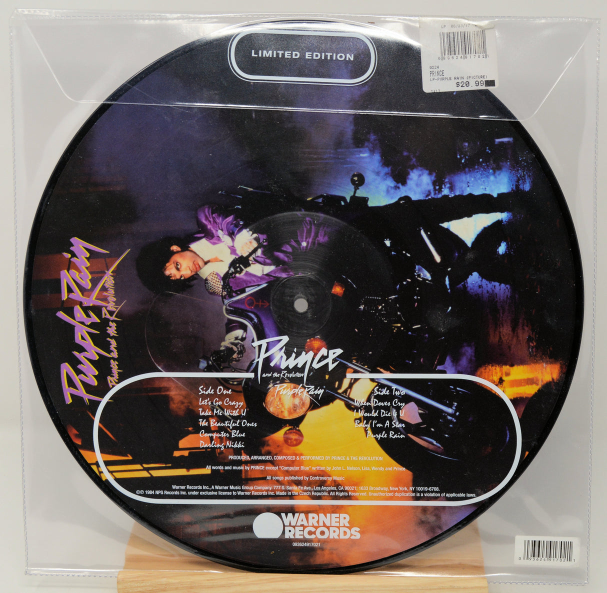 Limited edition Prince record with colorful design and Warner Records branding.