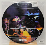 Limited edition Prince record with colorful design and Warner Records branding.