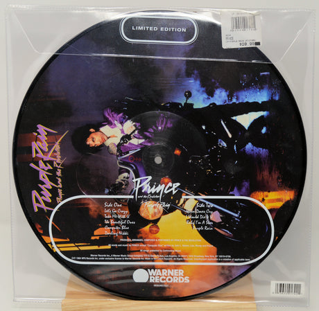 Limited edition Prince record with colorful design and Warner Records branding.