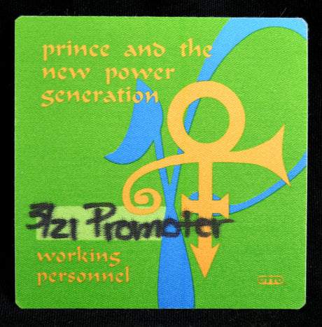 Green backstage pass with Prince and the New Power Generation logo and text