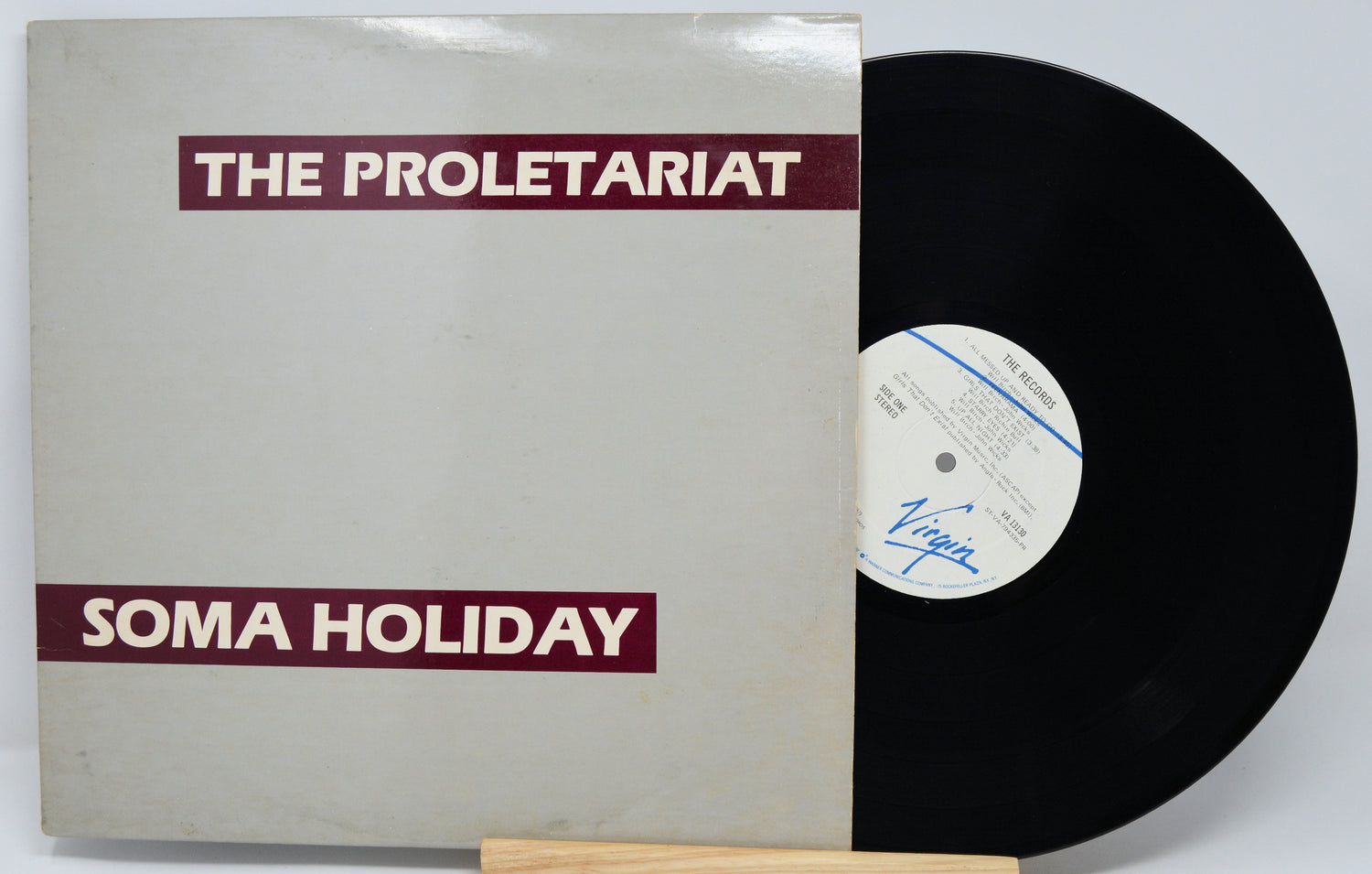 Vinyl record with 'The Proletariat' and 'Soma Holiday' on the cover