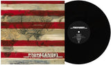Vinyl record with a world map design on the cover and black record.