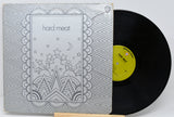 Front cover of Hard Meat vinyl LP with psychedelic artwork and exposed record