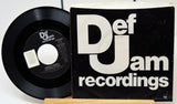 Vinyl record and Def Jam Recordings logo on a white background