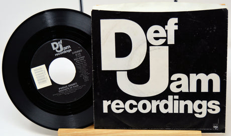 Vinyl record and Def Jam Recordings logo on a white background