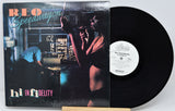 Vinyl record and cover for REO Speedwagon's 'Hi in Fidelity' on a white background