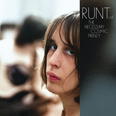 Album cover with a person's face on the left and text on the right, featuring the title 'Runt Live: The Necessary Cosmic Frenzy'.