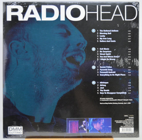 Radiohead 'DMM Cutting' vinyl record cover, showing the back of the black sleeve with a blue-toned portrait, tracklist, and barcode.