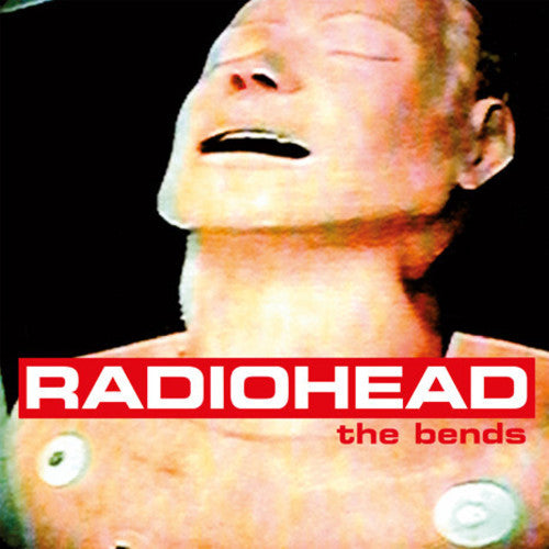 Album cover for Radiohead's 'The Bends' featuring a close-up of a person with a black background.