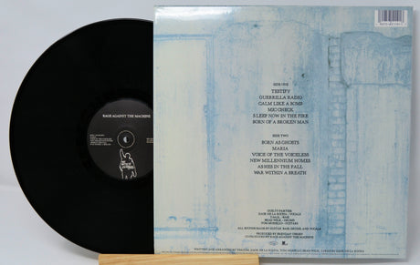 Back cover and vinyl record of Rage Against the Machine's The Battle of Los Angeles album, tracklist visible