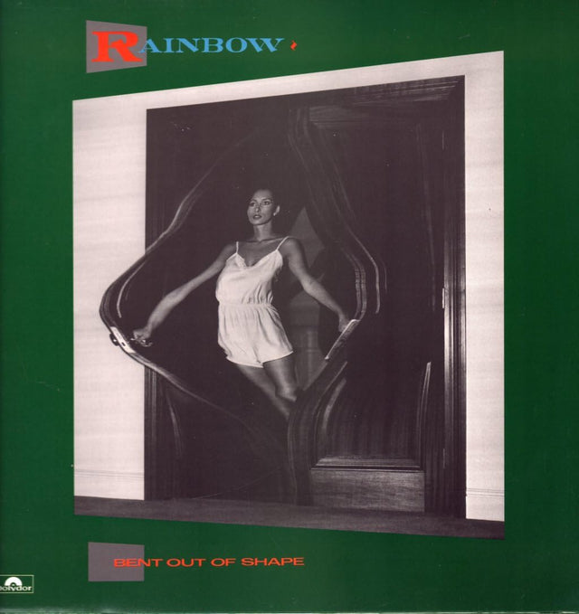 Album cover with a woman in a white dress behind a curtain, featuring the 'Rainbow' logo.