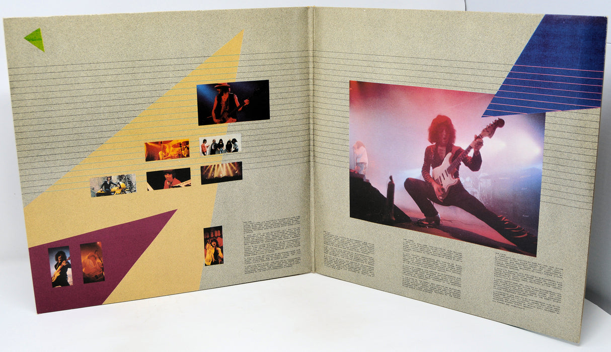 Open album cover with geometric design and images of a person playing guitar.
