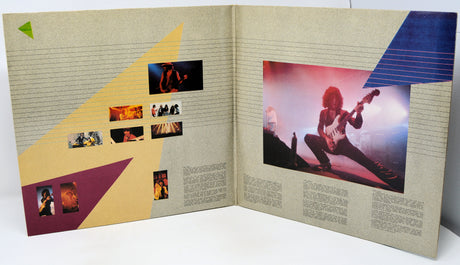 Open album cover with geometric design and images of a person playing guitar.