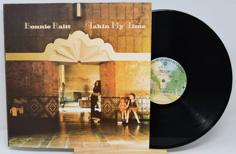 Vinyl record and cover of 'Takin' My Time' by Bonnie Raitt