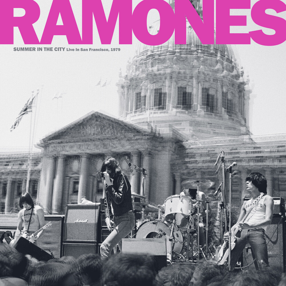 Band performing in front of a classical building with 'Ramones' branding.