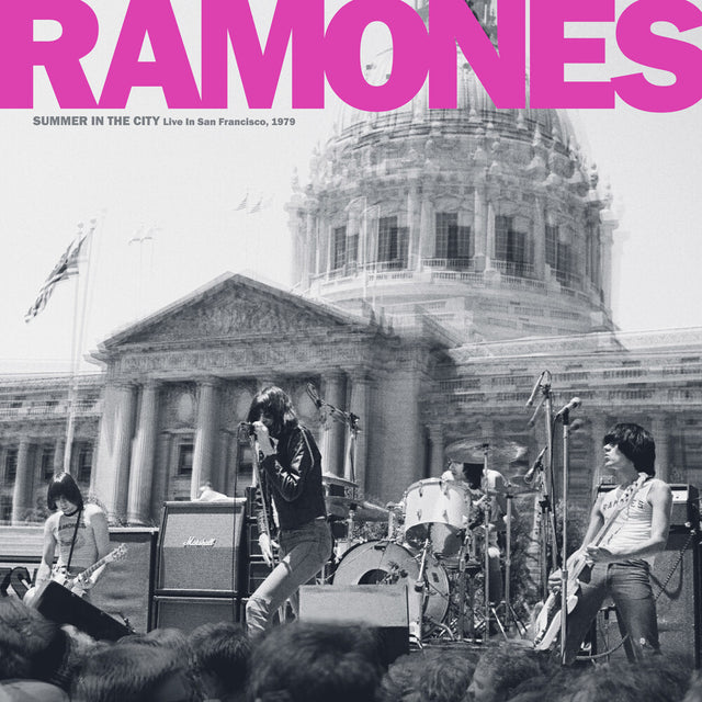 Band performing in front of a classical building with 'Ramones' branding.