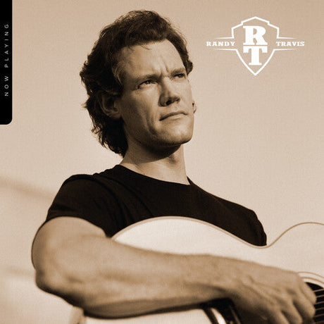 Close-up of Randy Travis Now Playing album cover featuring artist with guitar