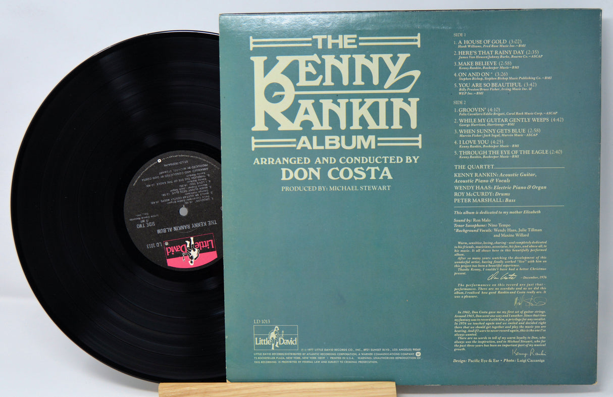 Vinyl record with green cover featuring text about 'The Kenny Rankin Album' arranged and conducted by Don Costa.