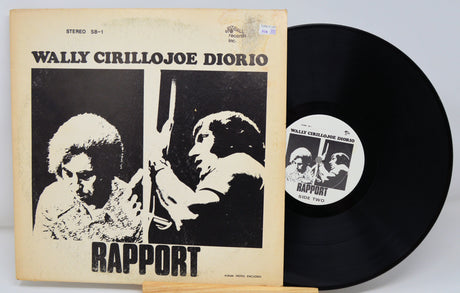 Front cover of 'Rapport' album by Wally Cirillo & Joe Diorio alongside the vinyl record