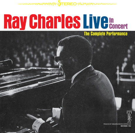 Album cover of 'Ray Charles Live in Concert' with a black and white photo of Ray Charles playing piano.