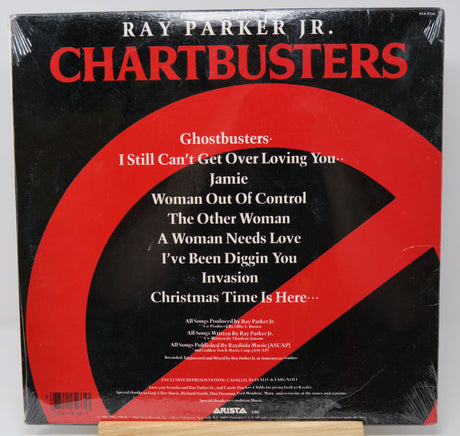 Album cover of 'Chartbusters' by Ray Parker Jr. with a red and black design.