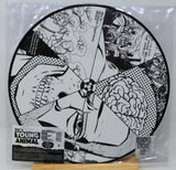 Vinyl record with black and white artwork and 'DC's Young Animal' label on a clear sleeve.