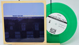 Vinyl record with green disc and cover featuring 'Reach the Sky' on a white background