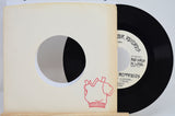 Red Sweater Records 7 inch vinyl single partially in a sleeve with red sweater illustration