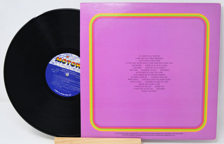 Vinyl record with a pink cover and blue label on a white background