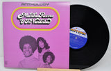 Vinyl record with a purple cover featuring 'Martha Reeves & The Vandellas - Anthology' and a black record.
