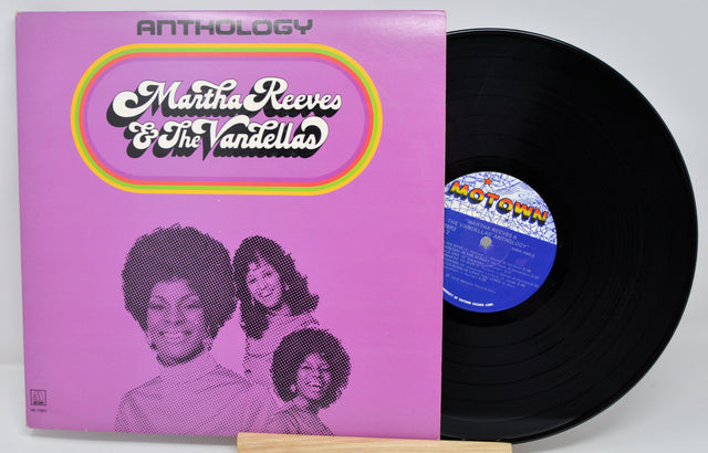 Vinyl record with a purple cover featuring 'Martha Reeves & The Vandellas - Anthology' and a black record.