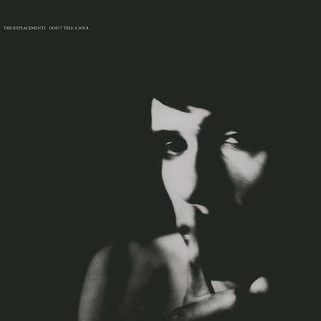 Replacements, The - Don't Tell A Soul This image features the album cover for "Don't Tell A Soul" by The Replacements. The cover art is in black and white and depicts a close-up portrait of a member of the band, with the band’s name at the top.