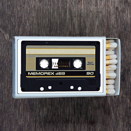 Matchbox styled as a vintage Memorex dBS cassette tape with white-tipped matches inside
