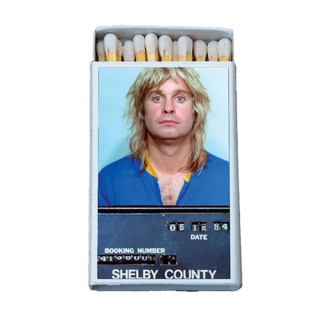 Matchbox with retro mugshot of a man with blonde hair and Shelby County details