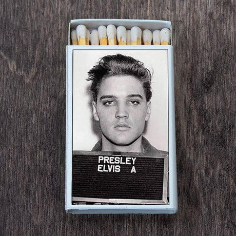 Open matchbox featuring a retro black and white mugshot print on top