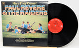 Vinyl record with cover featuring 'Paul Revere & The Raiders' on a white background