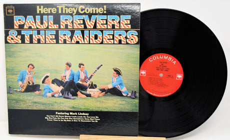 Vinyl record with cover featuring 'Paul Revere & The Raiders' on a white background