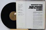 Vinyl record with cover featuring 'Paul Revere & The Raiders' and 'Kinks' on a white background